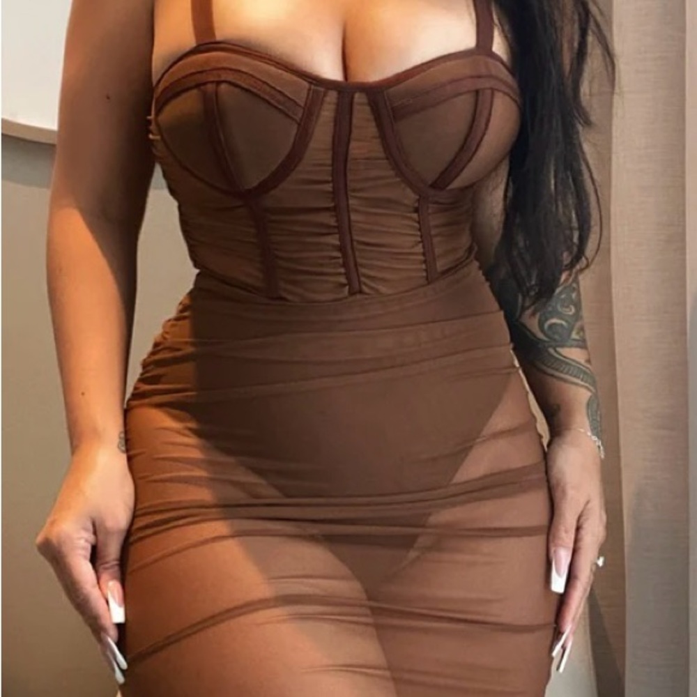 Mixed feelings mini dress, mesh material is stretchy. Never worn.